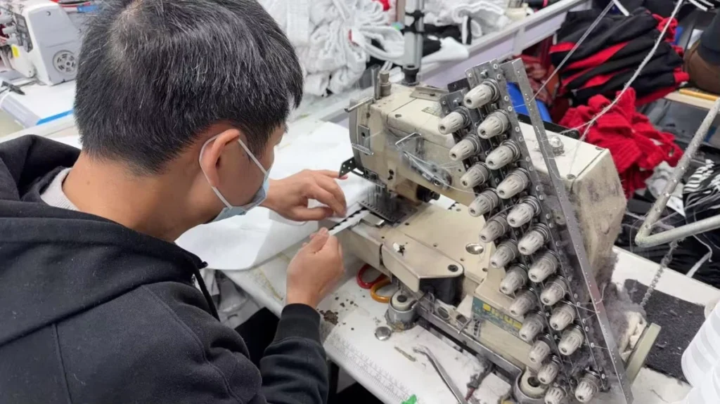 Close view of a garment sewing operation