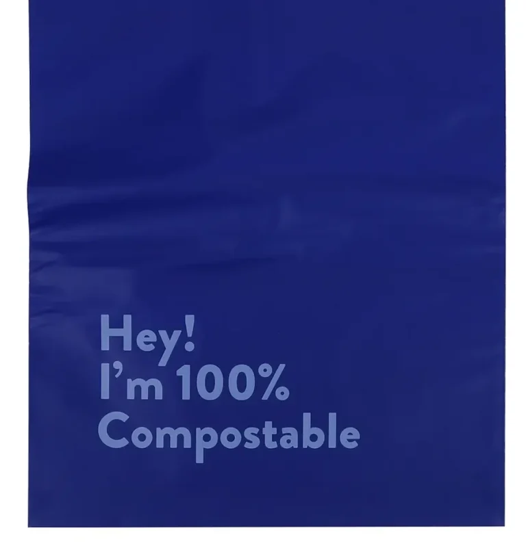 Navy compostable mailer bag printed 'Hey! I'm 100% Compostable'