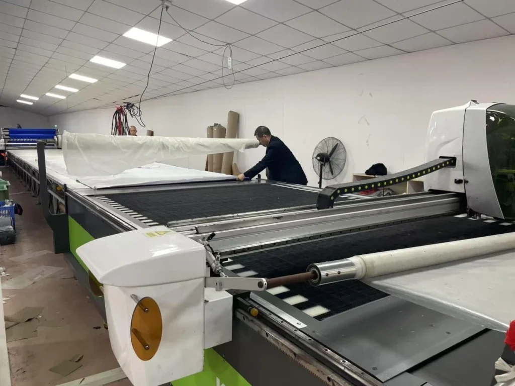 Precision fabric cutting for consistent garment dimensions