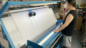 Fabric inspection and spreading equipment